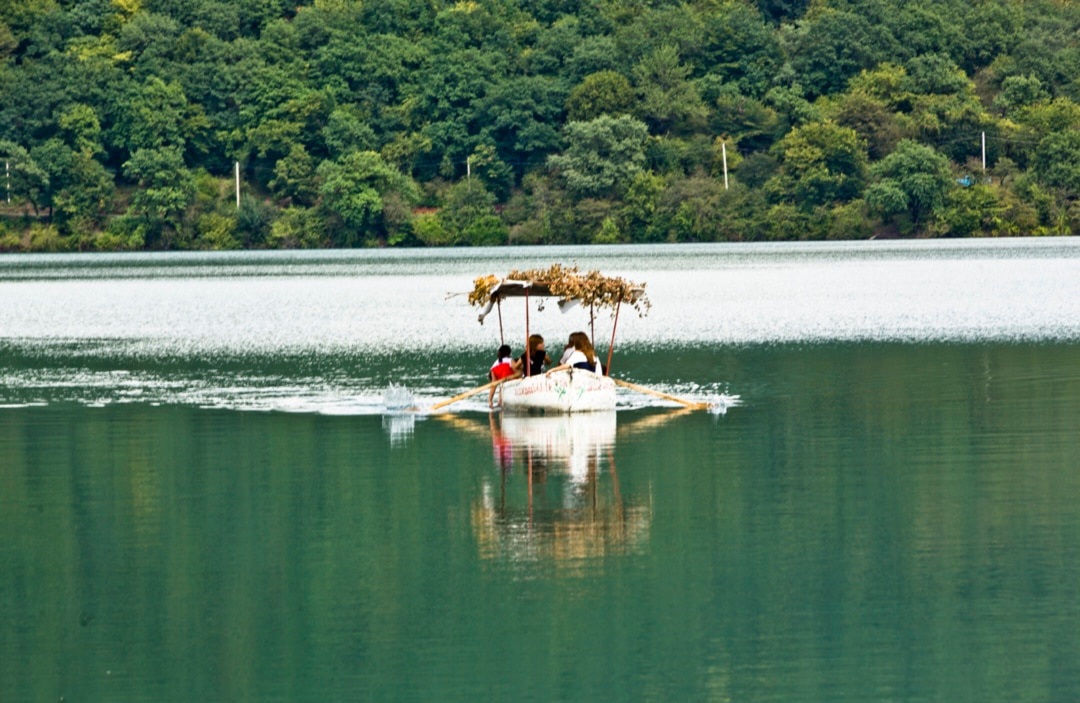 Nohur Lake with view of mountains. Boating, restaurant and some attractions for kids.